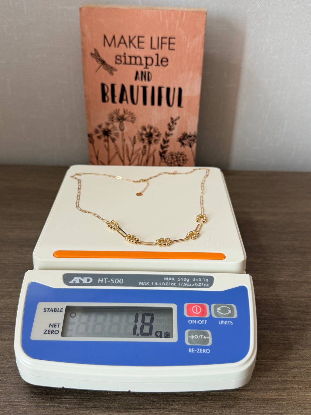 18karat gold ball and string necklace