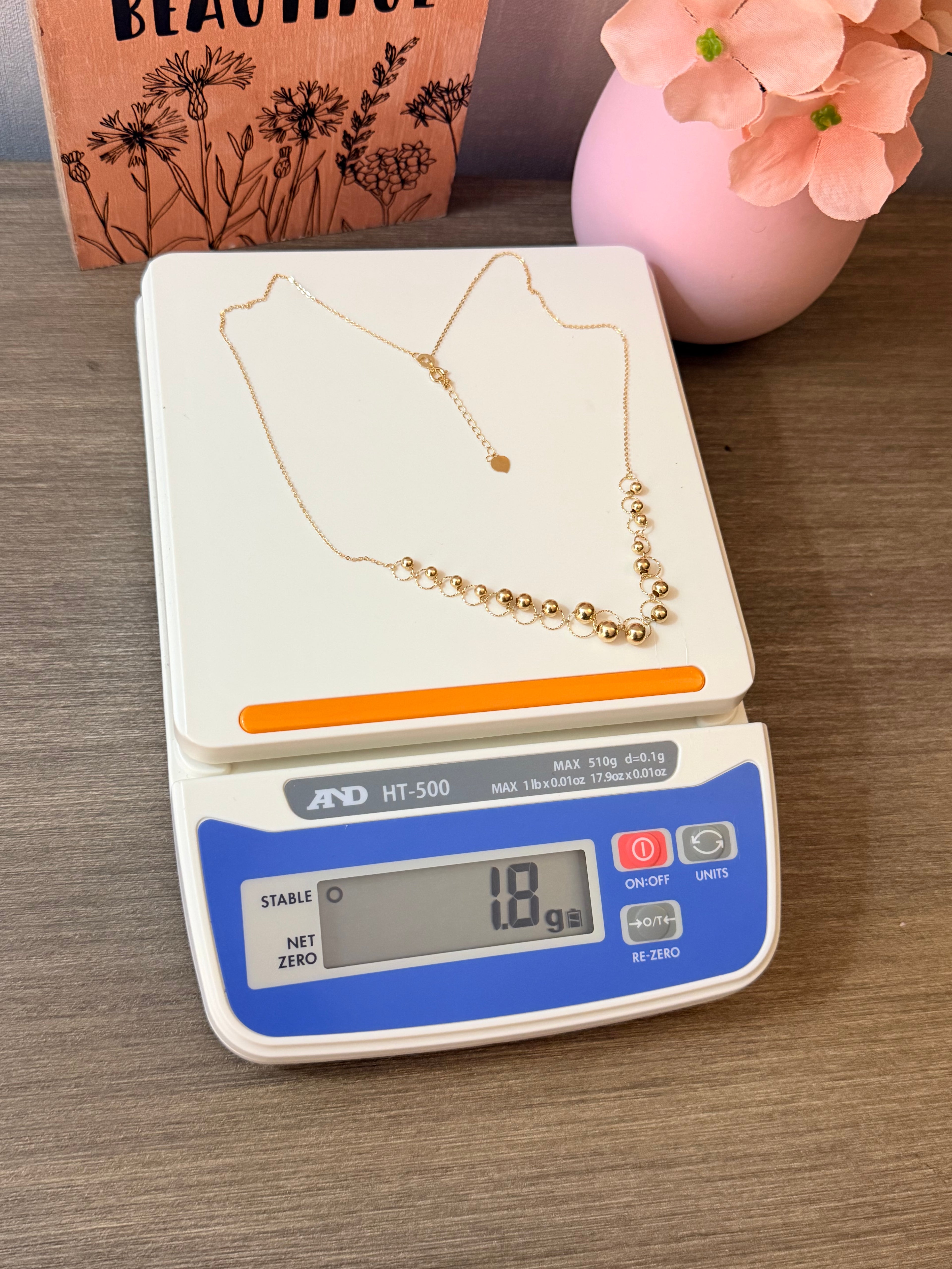 18karat gold ball tiny chain 18 inches